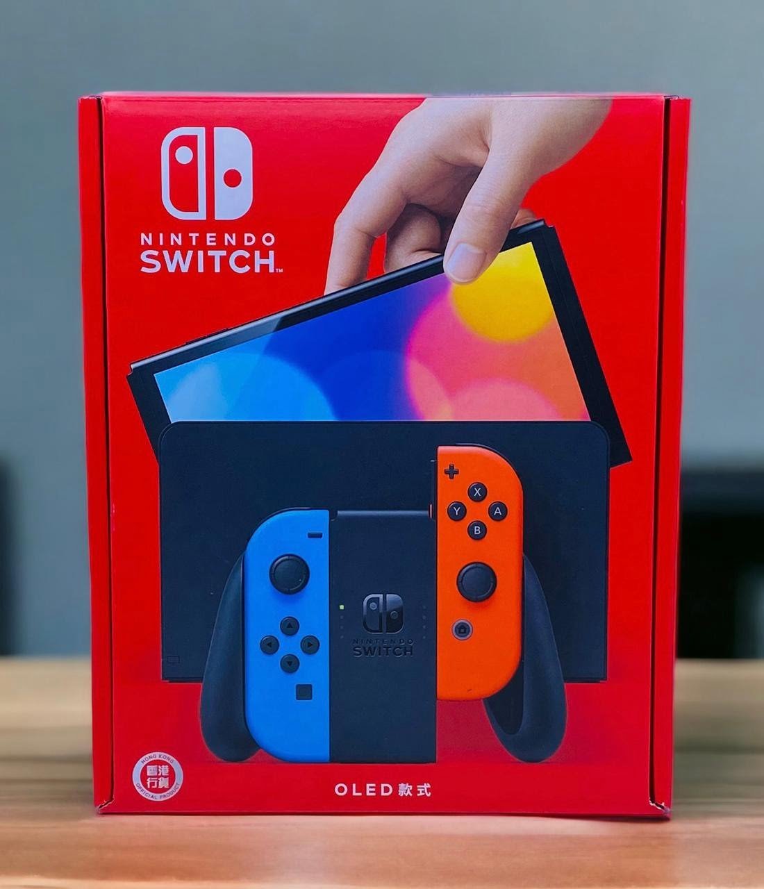 NINTENDO SWITCH OLED CONSOLE WITH BLUE-RED JOY-CON thumbnail 3